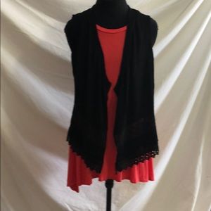 Black coverlet vest with lace inlays